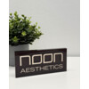 NOON LOGO SHELF SIGN